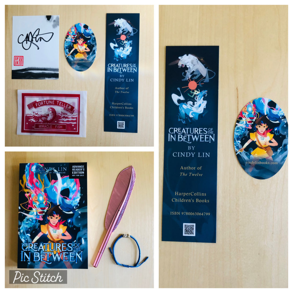 Swag samples: bookmark, sticker, bookplate, annotated ARC, feather pen, fortune telling fish, piyao bracelet